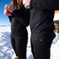 Close Up of Point6 Merino wool leggings being worn by 2 people holding cups 