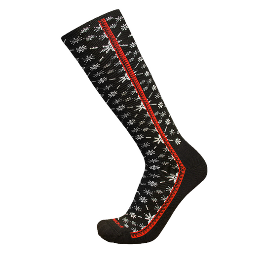 A pair of over-the-calf merino wool ski socks with a geometric pattern in black, white, and red colors, and a thickness measurement graphic illustration.