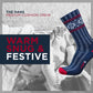 Blue and red patterned sock with text 'The Hans Medium Cushion Crew Warm Snug & Festive' on a gray background.