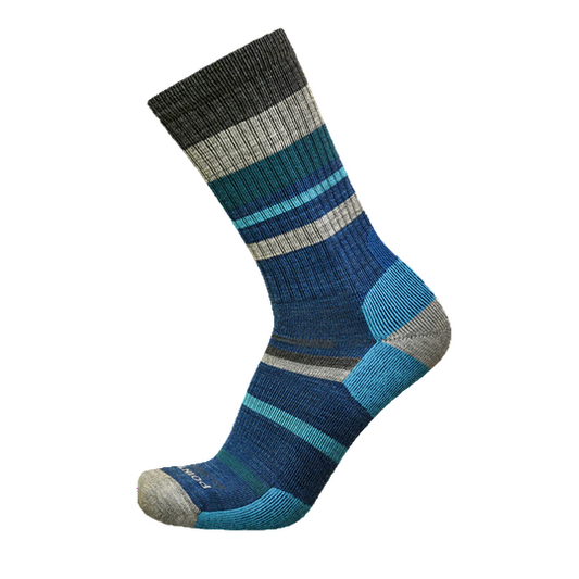A crew height merino wool sock with mixed horizontal stripes in various colours.